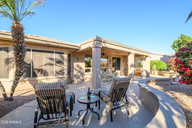 view of patio / terrace with ceiling fan