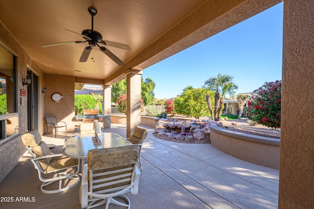 view of patio with ceiling fan