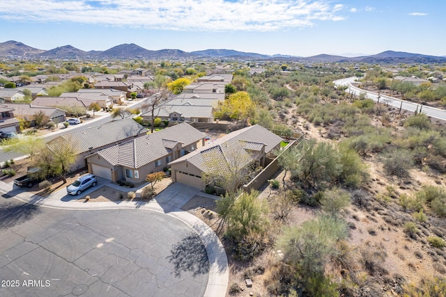 drone / aerial view with a residential view and a mountain view