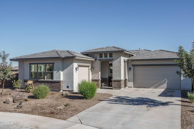 prairie-style home with a garage