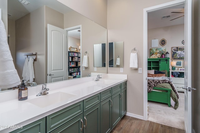 bathroom featuring vanity and ceiling fan