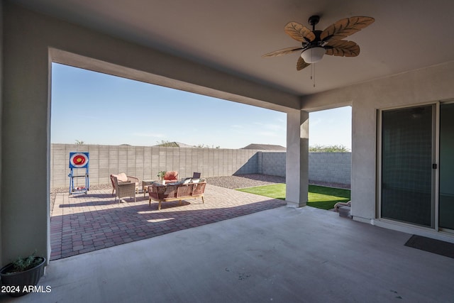 view of patio / terrace featuring ceiling fan