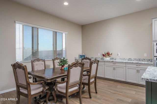 dining room featuring light hardwood / wood-style flooring