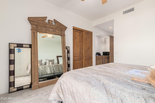 carpeted bedroom with ceiling fan