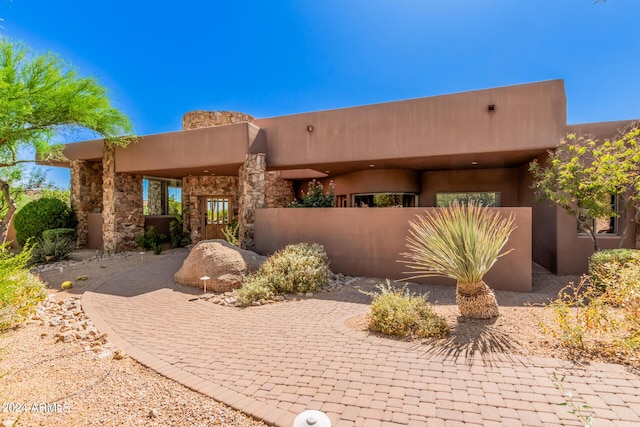 view of pueblo revival-style home