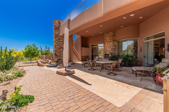 view of patio / terrace featuring a balcony