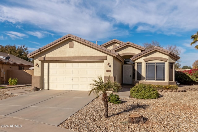 view of front of property featuring a garage