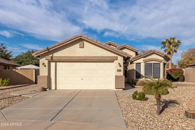 view of front of property featuring a garage