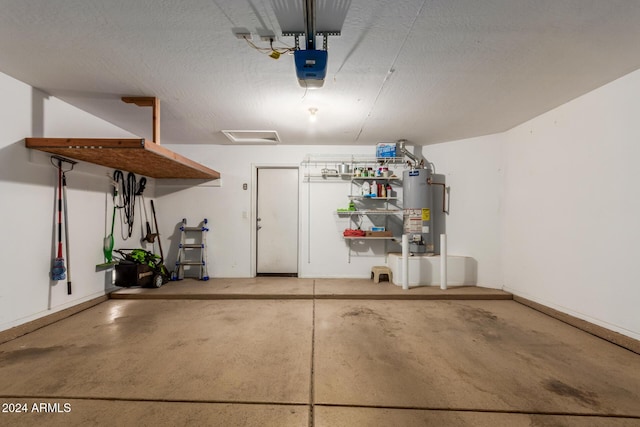 garage with gas water heater and a garage door opener