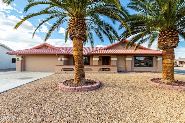 view of front of property featuring a garage