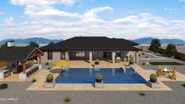 view of swimming pool featuring a mountain view, a gazebo, and a patio area