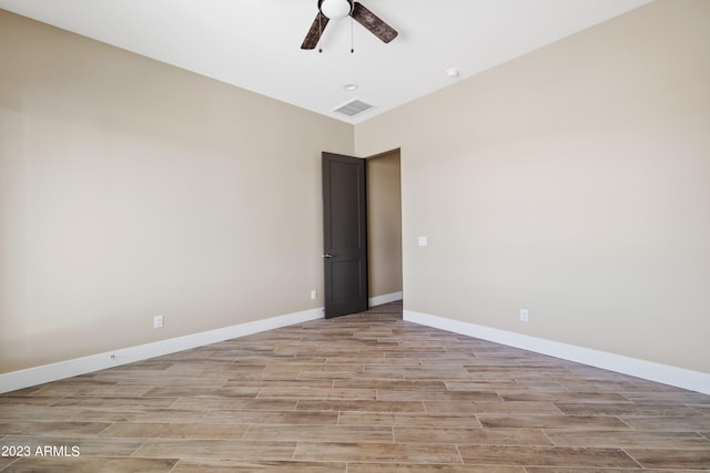 spare room featuring ceiling fan