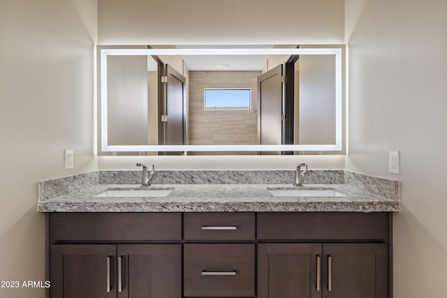 bathroom featuring double vanity