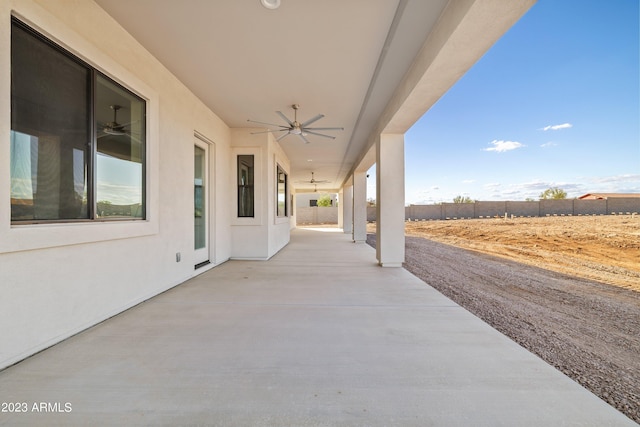 view of patio featuring ceiling fan