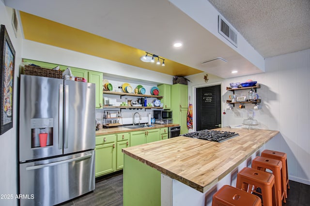 1340 E Townley Ave, Phoenix, AZ 85020 - kitchen with stainless steel fridge with ice dispenser, green cabinetry, butcher block counters, and open shelves