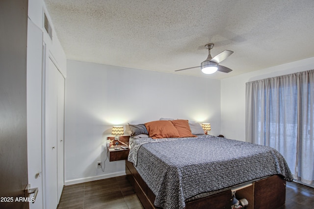 1340 E Townley Ave, Phoenix, AZ 85020 - bedroom with ceiling fan and a textured ceiling