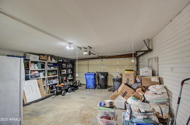 1340 E Townley Ave, Phoenix, AZ 85020 - garage with freestanding refrigerator and a garage door opener