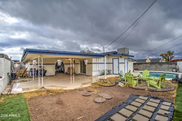 1340 E Townley Ave, Phoenix, AZ 85020 - rear view of property with a patio, stucco siding, and a fenced backyard