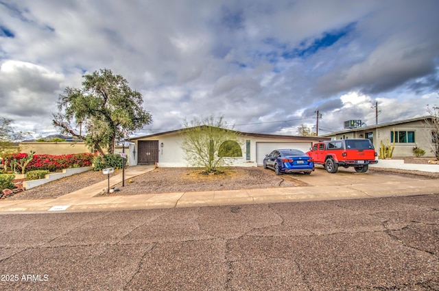 1340 E Townley Ave, Phoenix, AZ 85020 - ranch-style house featuring a garage and driveway