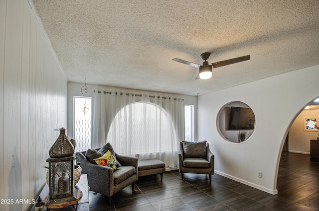 1340 E Townley Ave, Phoenix, AZ 85020 - sitting room with arched walkways, a textured ceiling, and a ceiling fan