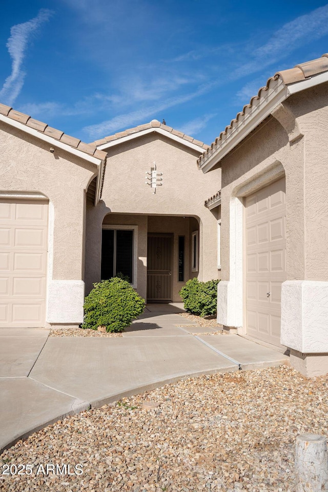 entrance to property with a garage