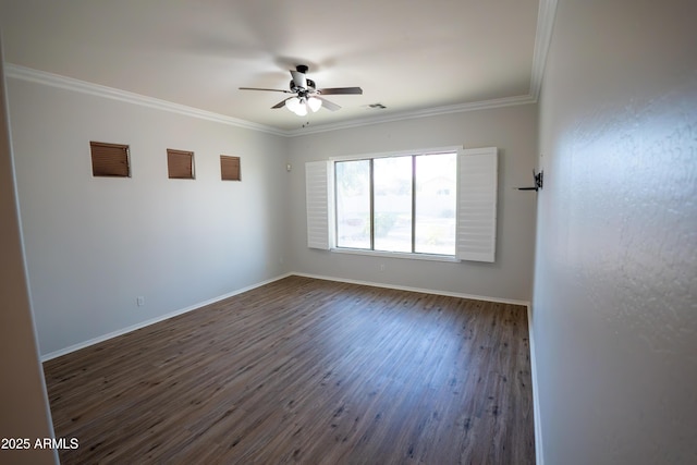 spare room with crown molding, dark hardwood / wood-style floors, and ceiling fan