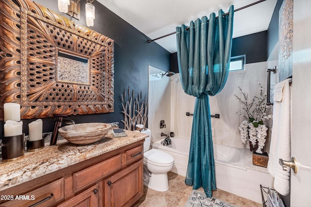 bathroom featuring vanity, shower / tub combo, and toilet