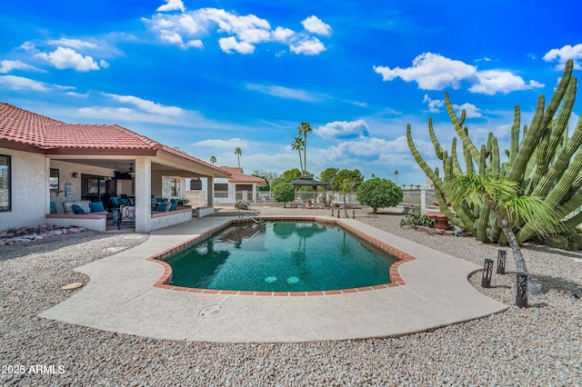 view of swimming pool with a patio, fence, a fenced in pool, a gazebo, and outdoor lounge area