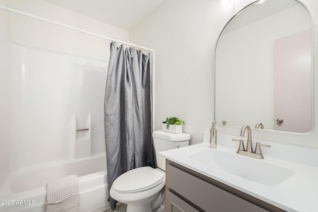 bathroom featuring shower / bathtub combination with curtain, vanity, and toilet