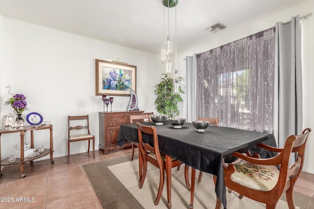 14363 W Acapulco Ln, Surprise, AZ 85379 - dining space with light tile patterned flooring and visible vents