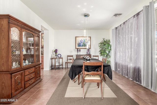14363 W Acapulco Ln, Surprise, AZ 85379 - dining space with tile patterned flooring and visible vents