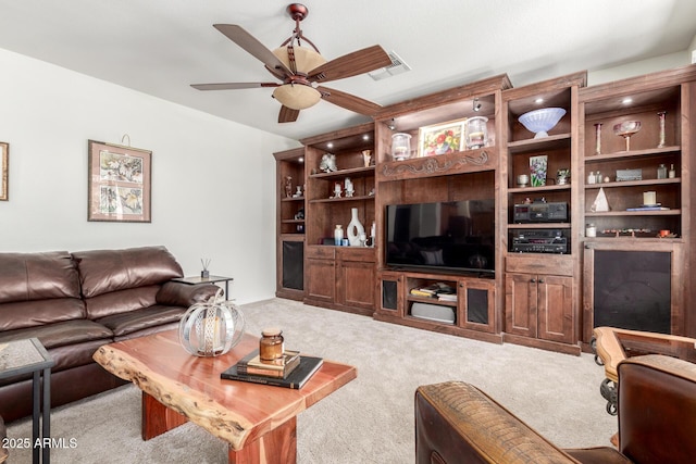 14363 W Acapulco Ln, Surprise, AZ 85379 - carpeted living room featuring ceiling fan and visible vents