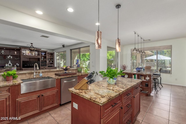 14363 W Acapulco Ln, Surprise, AZ 85379 - kitchen with light tile patterned flooring, a sink, light stone countertops, dishwasher, and visible vents