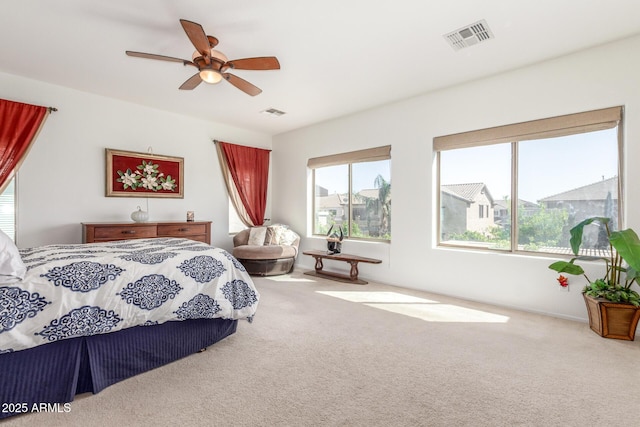 14363 W Acapulco Ln, Surprise, AZ 85379 - carpeted bedroom featuring ceiling fan and visible vents