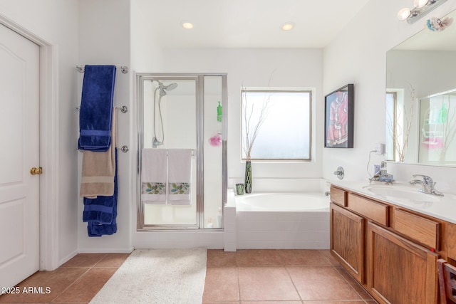14363 W Acapulco Ln, Surprise, AZ 85379 - full bath with a bath, a stall shower, tile patterned floors, and vanity
