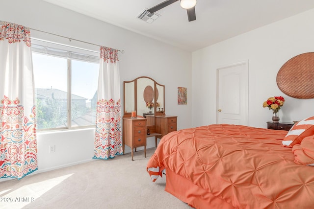 14363 W Acapulco Ln, Surprise, AZ 85379 - carpeted bedroom featuring multiple windows, ceiling fan, and visible vents
