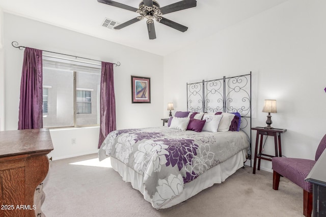 14363 W Acapulco Ln, Surprise, AZ 85379 - bedroom featuring a ceiling fan, light carpet, and visible vents