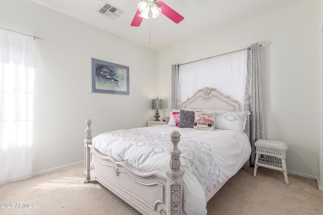 14363 W Acapulco Ln, Surprise, AZ 85379 - bedroom featuring carpet floors, baseboards, ceiling fan, and visible vents