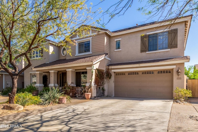 14363 W Acapulco Ln, Surprise, AZ 85379 - craftsman house featuring driveway, a tile roof, covered porch, stucco siding, and an attached garage