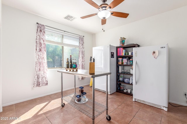 14363 W Acapulco Ln, Surprise, AZ 85379 - office space featuring baseboards, visible vents, tile patterned floors, and a ceiling fan
