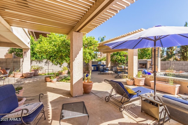 14363 W Acapulco Ln, Surprise, AZ 85379 - view of patio featuring a fenced backyard, outdoor dining space, and a pergola