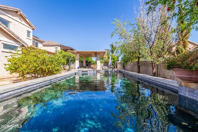 14363 W Acapulco Ln, Surprise, AZ 85379 - view of pool with a fenced in pool and a fenced backyard