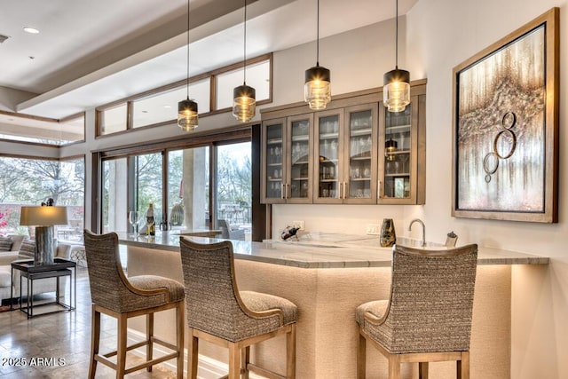 bar featuring recessed lighting, visible vents, and pendant lighting