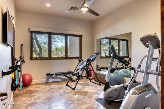 exercise room featuring visible vents, stone finish flooring, baseboards, ceiling fan, and recessed lighting