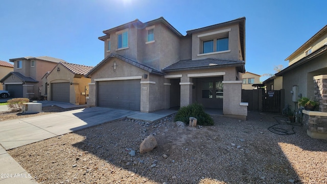 view of front of home featuring a garage and central AC