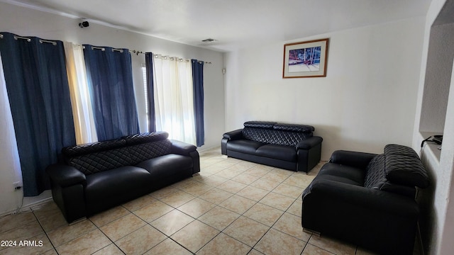 living room with light tile patterned floors