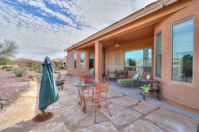 view of patio with outdoor dining space