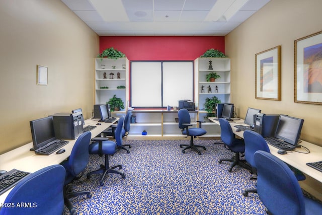 office space featuring a paneled ceiling