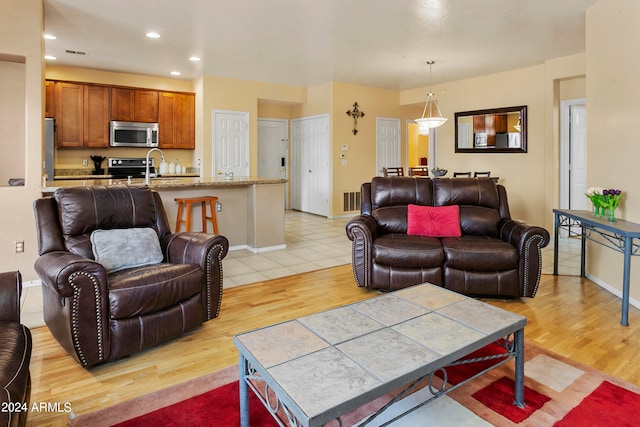 living room featuring light hardwood / wood-style flooring