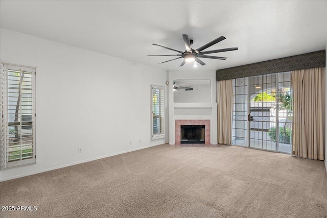 5200 S Lakeshore Dr Unit 120, Tempe, AZ 85283 - unfurnished living room with ceiling fan, carpet flooring, plenty of natural light, and a tiled fireplace